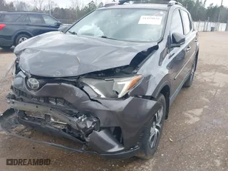 2018 Toyota RAV4 LE with VIN 2T3ZFREV9JW453996, listed as a IAAI auction lot 41499826 with 105,167 mi miles. Bid and sale history available at carsss.com. Image 18.