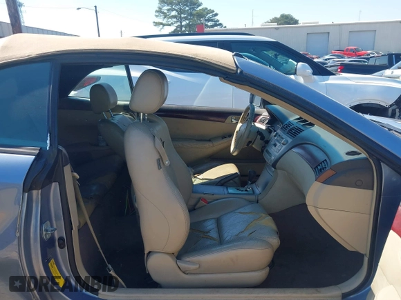 2004 Toyota Solara SE with VIN 4T1FA38P04U028451, listed as a IAAI auction lot 41773541 with 176,965 mi miles. Bid and sale history available at carsss.com. Image 5.