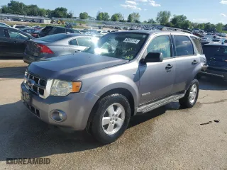 2008 Ford Escape XLT with VIN 1FMCU031X8KA77833, listed as a Copart auction lot 52677714 with 218,934 mi miles and Non Repairable. Bid and sale history available at carsss.com. Image 1.