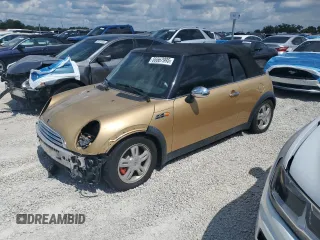 2005 MINI Convertible with VIN WMWRF334X5TG11889, listed as a Copart auction lot 55567995 with 169,717 mi miles and Salvage title. Bid and sale history available at DreamBid. Image 1.