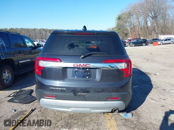 2021 GMC Acadia SLE with VIN 1GKKNKLA9MZ136112, listed as a IAAI auction lot 41212337 with 76,827 mi miles and . Bid and sale history available at DreamBid. Image 16.