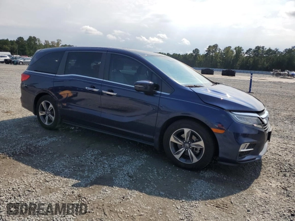 2020 Honda Odyssey Touring with VIN 5FNRL6H85LB003302, listed as a Copart auction lot 72709924 with 58,228 mi miles and Salvage Title. Bid and sale history available at DreamBid. Image 4.