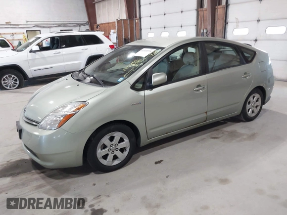 2007 Toyota Prius with VIN JTDKB20U477689351, listed as a IAAI auction lot 42110774 with 181,194 mi miles and . Bid and sale history available at DreamBid. Image 2.