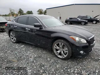 2013 Infiniti M37 with VIN JN1BY1AR7DM602898, listed as a Copart auction lot 79748604 with 247,068 mi miles and Salvage Title. Bid and sale history available at carsss.com. Image 4.