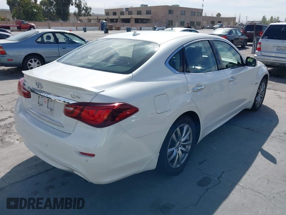 2016 Infiniti Q70 with VIN JN1EY1AP9GM470064, listed as a IAAI auction lot 42647765 with 111,474 mi miles and . Bid and sale history available at DreamBid. Image 4.