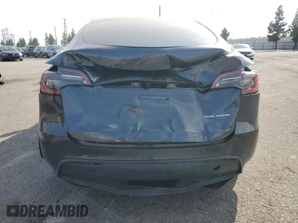 2024 Tesla Model Y Long Range with VIN 7SAYGDEE2RA244242, listed as a Copart auction lot 52635095 with 4,994 mi miles and Salvage title. Bid and sale history available at DreamBid. Image 6.