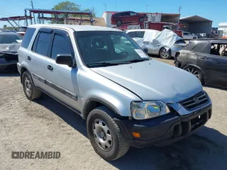 2000 Honda CR-V LX with VIN JHLRD2846YC009880, listed as a IAAI auction lot 41830061 with 263,177 mi miles. Bid and sale history available at carsss.com. Image 1.