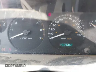 2004 Jeep Grand Cherokee Laredo with VIN 1J4GW48S74C260968, listed as a IAAI auction lot 42050628 with 192,602 mi miles. Bid and sale history available at carsss.com. Image 7.