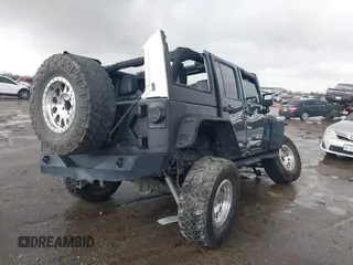 2018 Jeep Wrangler Unlimited Rubicon Recon with VIN 1C4BJWFG3JL840951, listed as a IAAI auction lot 41474583 with 121,971 mi miles and . Bid and sale history available at DreamBid. Image 4.