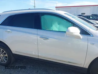 2017 Cadillac XT5 Luxury FWD with VIN 1GYKNBRS1HZ304062, listed as a IAAI auction lot 42460981 with 77,310 mi miles and . Bid and sale history available at DreamBid. Image 13.