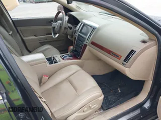 2008 Cadillac STS RWD with VIN 1G6DK67V980165768, listed as a IAAI auction lot 42185454 with 214,813 mi miles and . Bid and sale history available at DreamBid. Image 5.