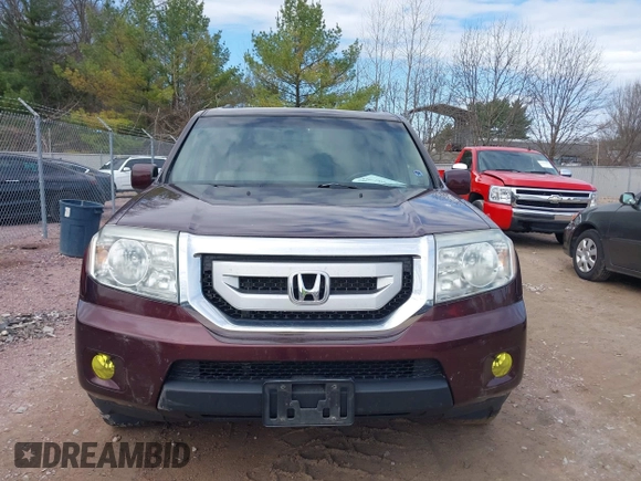 2011 Honda Pilot EX-L with VIN 5FNYF4H58BB001023, listed as a IAAI auction lot 42081793 with 171,062 mi miles and . Bid and sale history available at carsss.com. Image 12.