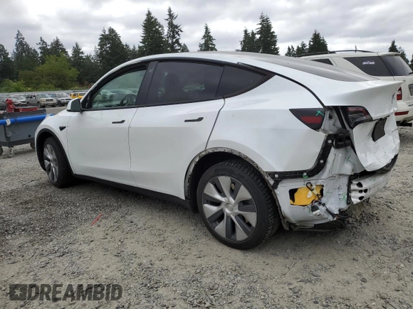 2023 Tesla Model Y Long Range z VIN 7SAYGDEE9PA081604, wystawiony jako Copart lot #60163785 z przebiegiem 42 134 mil mil oraz Szkoda całkowita • Salvage title. Historia ofert i sprzedaży dostępna na DreamBid. Obrazek 2.