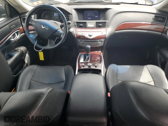 2018 Infiniti Q70 Luxe with VIN JN1BY1ARXJM220845, listed as a Copart auction lot 59738435 with 93,999 mi miles and Salvage title. Bid and sale history available at DreamBid. Image 8.