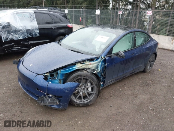 2023 Tesla Model 3 Long Range with VIN 5YJ3E1EB5PF704463, listed as a IAAI auction lot 41916627 with 14,305 mi miles and . Bid and sale history available at DreamBid. Image 2.