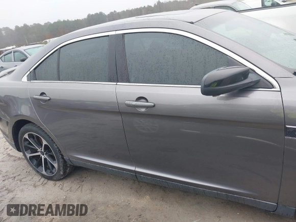 2014 Ford Taurus SHO with VIN 1FAHP2KT0EG171336, listed as a IAAI auction lot 41566688 with 154,328 mi miles. Bid and sale history available at carsss.com. Image 13.