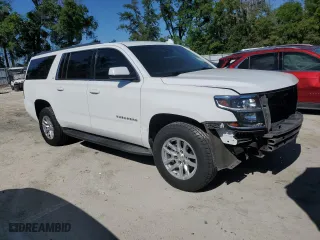 2015 Chevrolet Suburban LT with VIN 1GNSCJKC2FR738634, listed as a Copart auction lot 53527545 with 259,856 mi miles and Salvage Title. Bid and sale history available at carsss.com. Image 4.