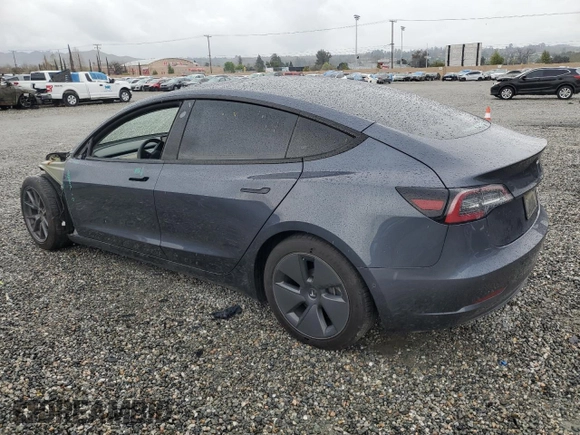 2022 Tesla Model 3 Long Range with VIN 5YJ3E1EB1NF112040, listed as a Copart auction lot 48695485 with 51,683 mi miles and Salvage Title. Bid and sale history available at DreamBid. Image 2.