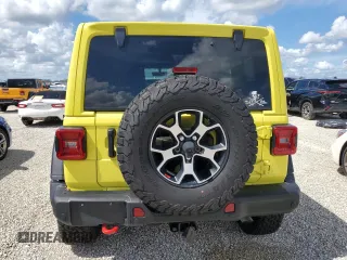 2022 Jeep Wrangler Unlimited Rubicon with VIN 1C4HJXFG3NW214174, listed as a Copart auction lot 74136484 with 5,292 mi miles and Salvage title. Bid and sale history available at DreamBid. Image 6.