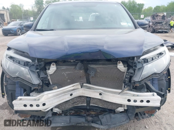 2016 Honda Pilot EX-L with VIN 5FNYF6H56GB073535, listed as a IAAI auction lot 42278814 with 111,156 mi miles and . Bid and sale history available at DreamBid. Image 6.
