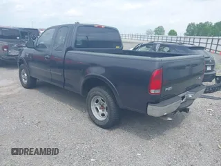 1999 Ford F-150 XL with VIN 1FTRX18L3XNA05021, listed as a IAAI auction lot 42138727 with 1 mi miles. Bid and sale history available at carsss.com. Image 3.