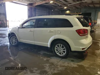 2017 Dodge Journey SXT with VIN 3C4PDCBG0HT572165, listed as a Copart auction lot 56673495 with Not provided miles and Salvage title. Bid and sale history available at DreamBid. Image 2.