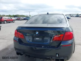 2013 BMW M5 with VIN WBSFV9C59DD096774, listed as a IAAI auction lot 41608286 with 82,601 mi miles. Bid and sale history available at carsss.com. Image 16.