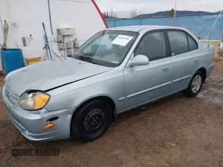2003 Hyundai Accent GL with VIN KMHCG45C43U465523, listed as a IAAI auction lot 40883056 with 95,770 mi miles. Bid and sale history available at carsss.com. Image 2.