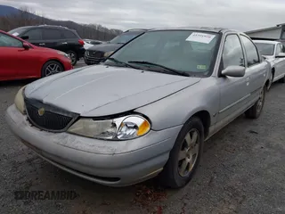 1998 Mercury Mystique z VIN 3MEFM66L2WM611980, wystawiony jako IAAI lot #41391920 z przebiegiem 199 491 mil mil oraz . Historia ofert i sprzedaży dostępna na DreamBid. Obrazek 6.