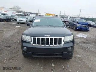 2011 Jeep Grand Cherokee Laredo with VIN 1J4RR4GGXBC511475, listed as a IAAI auction lot 41554620 with 164,361 mi miles. Bid and sale history available at carsss.com. Image 12.