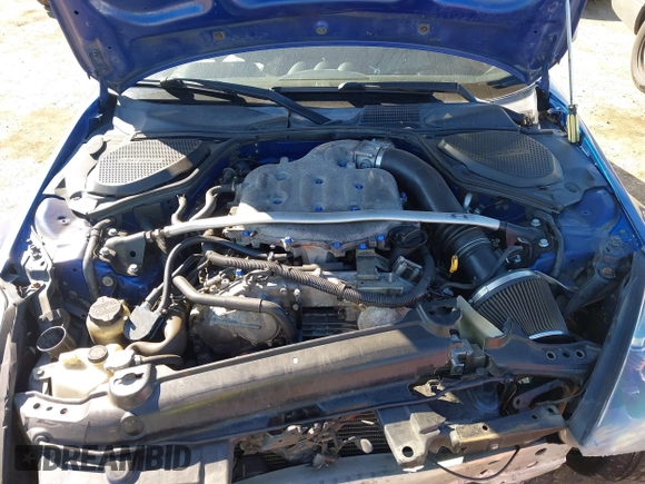 2004 Nissan 350Z Touring with VIN JN1AZ34D34T165329, listed as a IAAI auction lot 41872788 with 199,196 mi miles. Bid and sale history available at carsss.com. Image 10.
