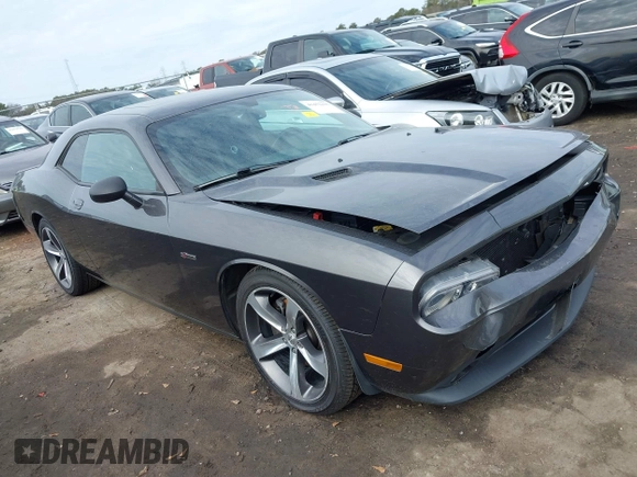 2014 Dodge Challenger R/T z VIN 2C3CDYBT7EH293104, wystawiony jako IAAI lot #41452435 z przebiegiem 49 728 mil mil oraz . Historia ofert i sprzedaży dostępna na DreamBid. Obrazek 1.