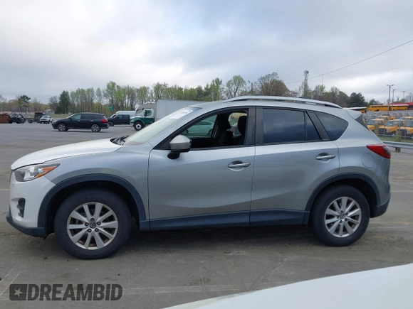 2013 Mazda CX-5 Touring with VIN JM3KE2CE0D0105115, listed as a IAAI auction lot 41899956 with 301,264 mi miles. Bid and sale history available at carsss.com. Image 14.
