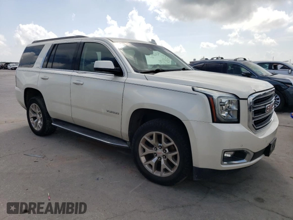 2015 GMC Yukon SLT z VIN 1GKS1BKC4FR552523, wystawiony jako Copart lot #54658135 z przebiegiem 93 907 mil mil oraz Czysty tytuł • Clean title. Historia ofert i sprzedaży dostępna na DreamBid. Obrazek 4.