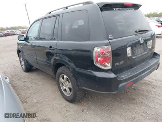 2007 Honda Pilot EX-L with VIN 2HKYF18517H513293, listed as a IAAI auction lot 41957031 with 264,875 mi miles. Bid and sale history available at carsss.com. Image 3.