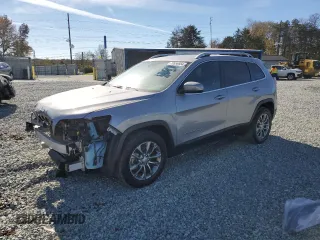 2021 Jeep Cherokee Latitude Plus z VIN 1C4PJLLBXMD211506, wystawiony jako Copart lot #79956854 z przebiegiem 60 873 mil mil oraz Szkoda całkowita • Salvage title. Historia ofert i sprzedaży dostępna na DreamBid. Obrazek 1.