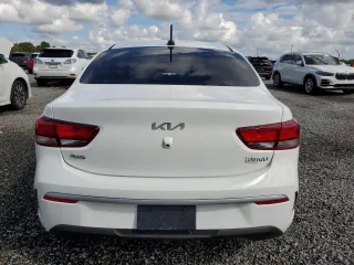2023 Kia Rio S with VIN 3KPA24AD3PE603095, listed as a Copart auction lot 74014854 with Not Provided miles and Salvage Title. Bid and sale history available at DreamBid. Image 6.
