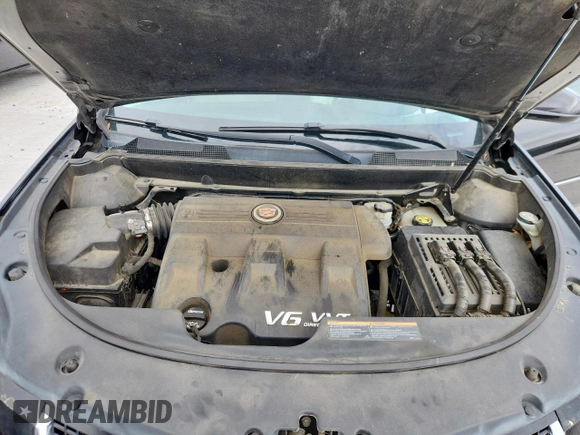 2016 Cadillac SRX Premium Collection with VIN 3GYFNDE35GS566884, listed as a Copart auction lot 62425985 with 27,133 mi miles and Salvage title. Bid and sale history available at DreamBid. Image 12.