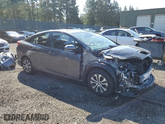 2021 Toyota Prius LE with VIN JTDKAMFP7M3185847, listed as a Copart auction lot 52897465 with 58,996 mi miles and Salvage Title. Bid and sale history available at DreamBid. Image 4.