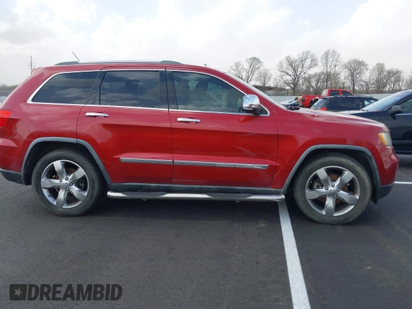 2011 Jeep Grand Cherokee Overland with VIN 1J4RS6GT4BC561169, listed as a IAAI auction lot 41847912 with 220,713 mi miles and . Bid and sale history available at DreamBid. Image 13.