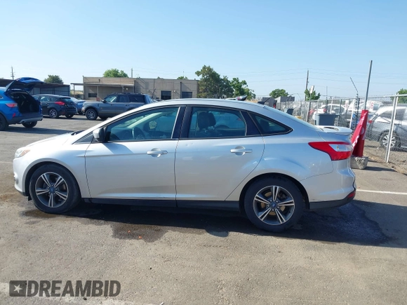 2012 Ford Focus SE z VIN 1FAHP3F28CL215997, wystawiony jako IAAI lot #42483639 z przebiegiem 101 518 mil mil oraz . Historia ofert i sprzedaży dostępna na DreamBid. Obrazek 14.