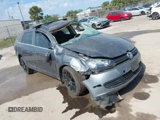 2014 Volkswagen Jetta SportWagen TDI w/Sunroof & Nav with VIN 3VWPL7AJ2EM602051, listed as a IAAI auction lot 41553277 with 114,981 mi miles. Bid and sale history available at carsss.com. Image 1.