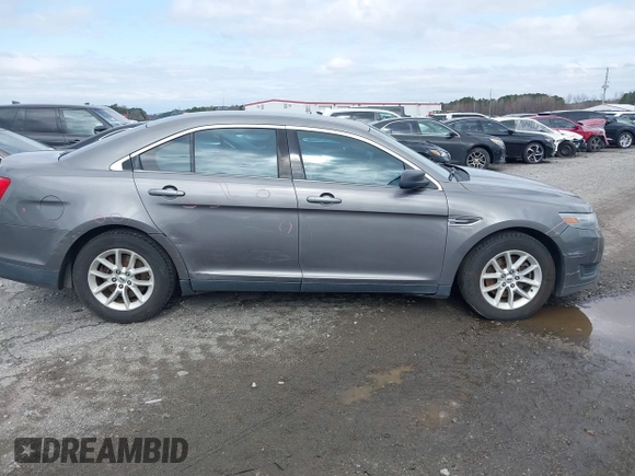 2014 Ford Taurus SE z VIN 1FAHP2D88EG143275, wystawiony jako IAAI lot #41801787 z przebiegiem 150 988 mil mil oraz . Historia ofert i sprzedaży dostępna na DreamBid. Obrazek 14.