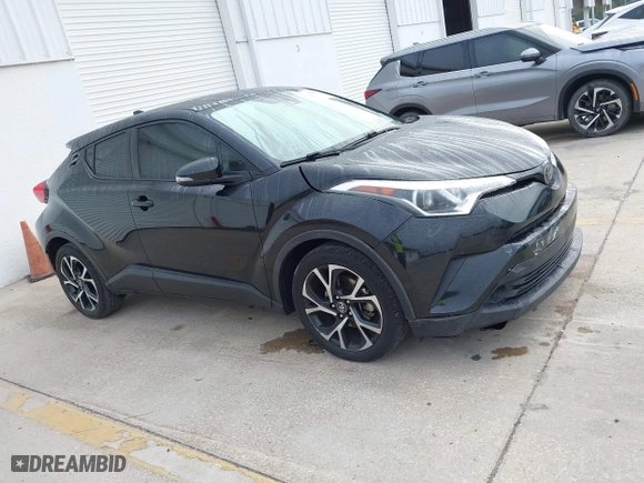 2019 Toyota C-HR XLE with VIN NMTKHMBX2KR094898, listed as a IAAI auction lot 41940883 with 94,351 mi miles. Bid and sale history available at carsss.com. Image 13.