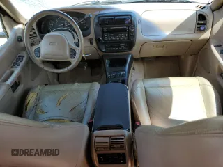 2000 Ford Explorer Eddie Bauer with VIN 1FMZU84PXYZB45910, listed as a Copart auction lot 71650514 with 234,398 mi miles and Salvage title. Bid and sale history available at DreamBid. Image 8.