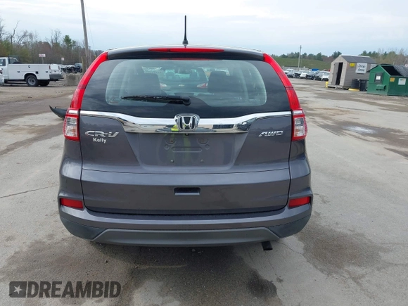 2015 Honda CR-V LX with VIN 5J6RM4H34FL031089, listed as a IAAI auction lot 42123159 with 74,566 mi miles and . Bid and sale history available at DreamBid. Image 16.