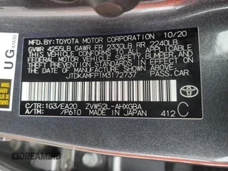 2021 Toyota Prius LE z VIN JTDKAMFP1M3172737, wystawiony jako Copart lot #57056205 z przebiegiem Nie podano mil oraz Szkoda całkowita • Salvage title. Historia ofert i sprzedaży dostępna na DreamBid. Obrazek 12.