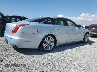 2014 Jaguar XJ with VIN SAJWA1CZ4E8V71167, listed as a Copart auction lot 43994545 with 69,682 mi miles and Salvage Title. Bid and sale history available at DreamBid. Image 3.