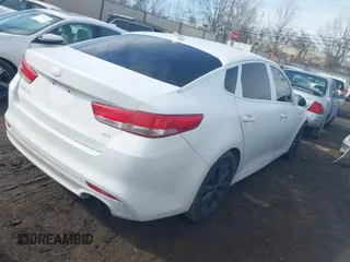 2016 Kia Optima EX with VIN 5XXGU4L39GG041624, listed as a IAAI auction lot 41653133 with 130,312 mi miles. Bid and sale history available at carsss.com. Image 4.