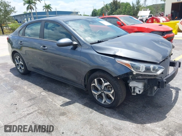 2021 Kia Forte LXS with VIN 3KPF24AD1ME353955, listed as a IAAI auction lot 42160127 with 61,719 mi miles. Bid and sale history available at carsss.com. Image 1.